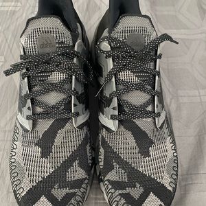 Adidas ultra boost size 13 camouflage sneakers.